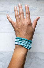 Load image into Gallery viewer, Blue Bliss Wrap brings together 3 types of handmade blue beads: Teal Blue Javanese Glass, Cadet Blue African Gooseberry beads, and Denim Blue African Goomba beads
